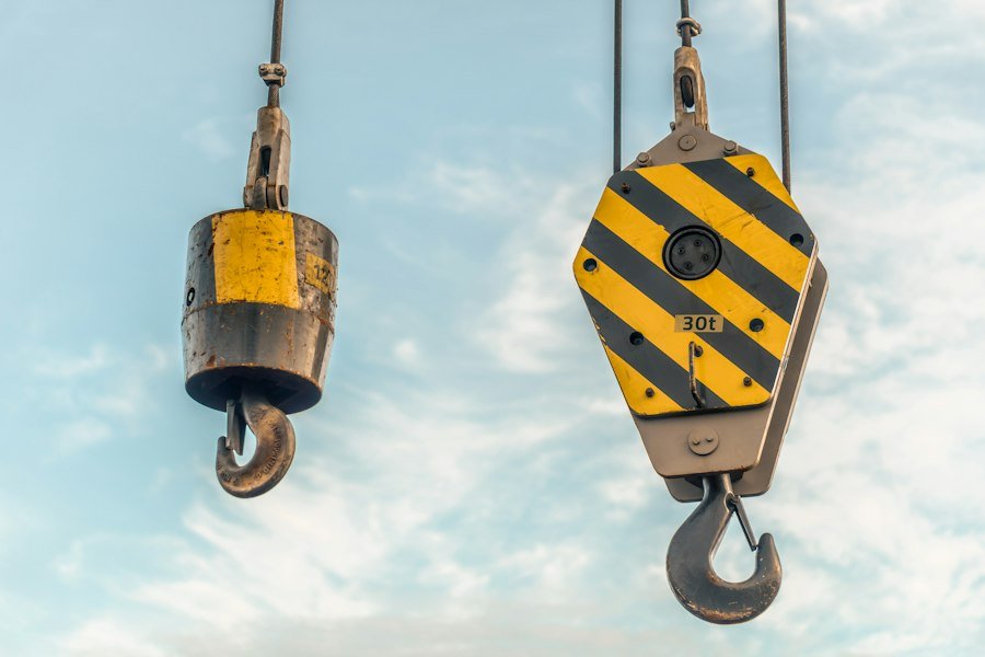 Photo goods hoists material handling reduction